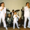Performing with my two brothers, Trey (far right) and Reed (peanut in the middle) back in the day.